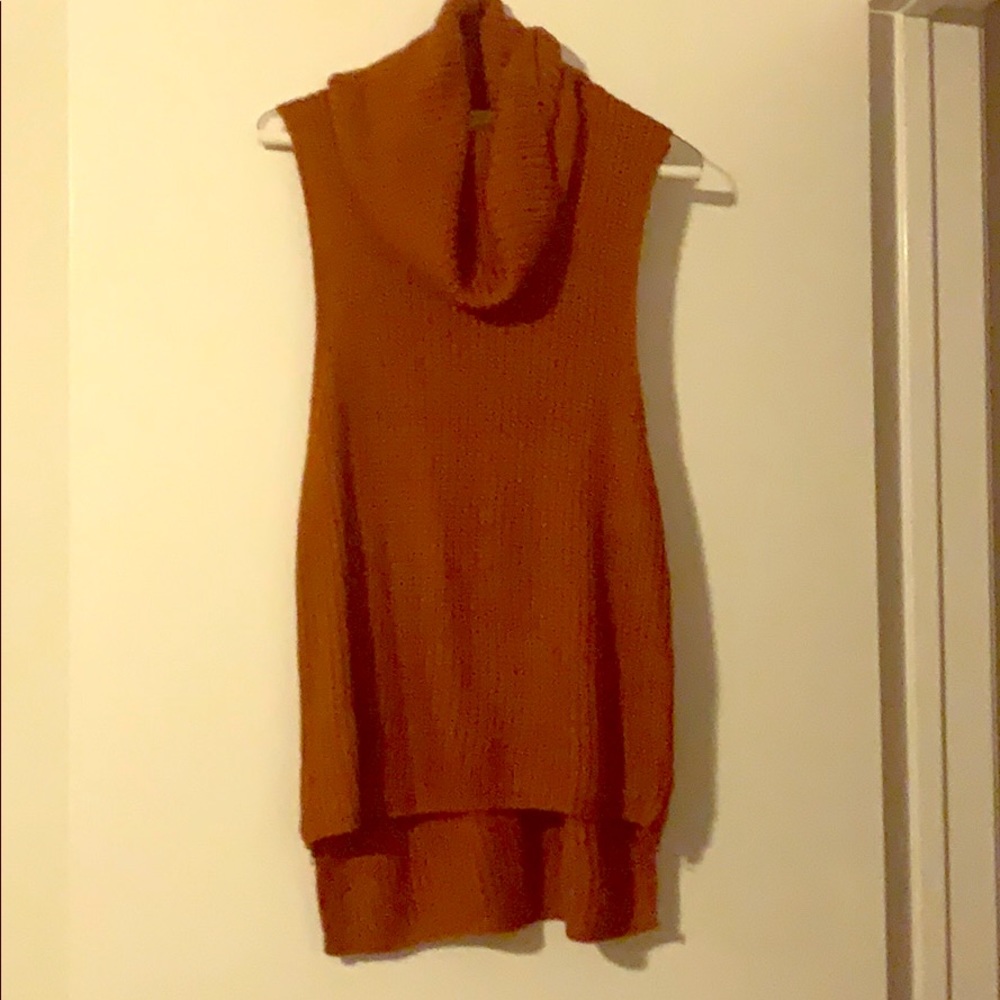Orange sweater tank with open sides and zip